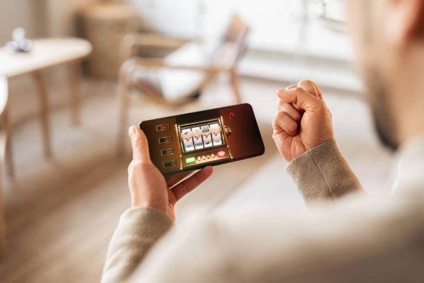 Android smartphone displaying Nolimit City Gates of Olympus bonus round with multiplier cascade